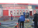 Filming outside the Clansman with rain effects.